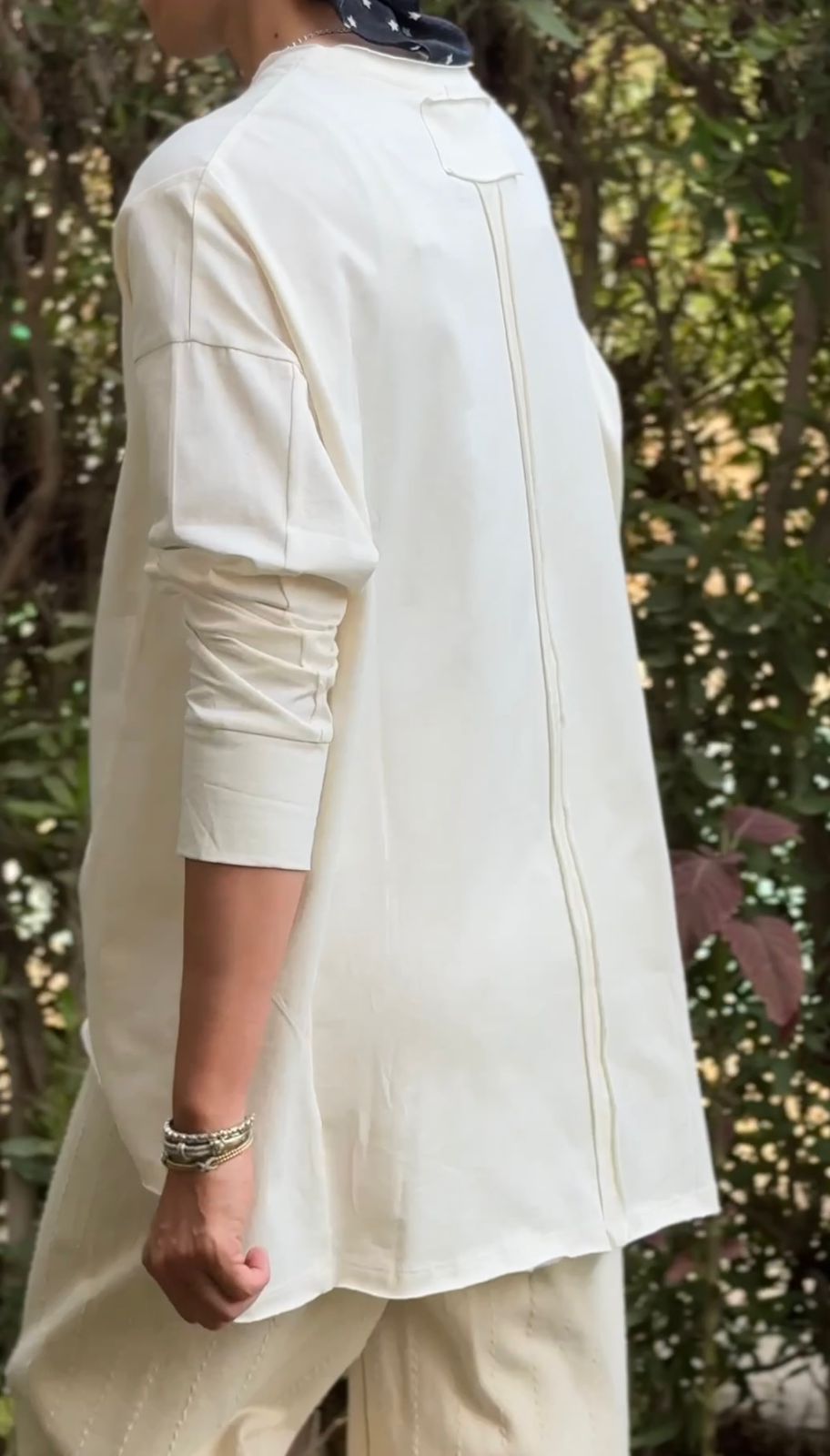 One size round neck cotton top unfinished at the back in light beige