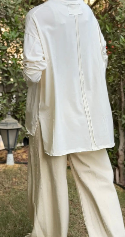 One size round neck cotton top unfinished at the back in light beige