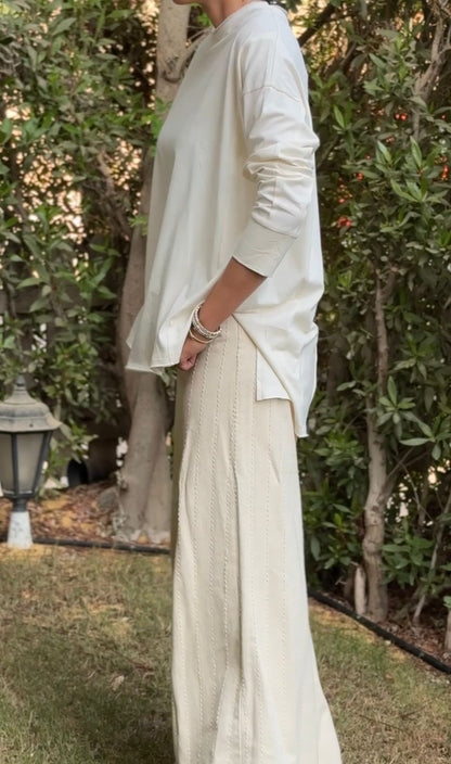 One size round neck cotton top unfinished at the back in light beige