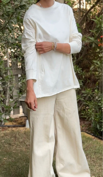 One size round neck cotton top unfinished at the back in light beige